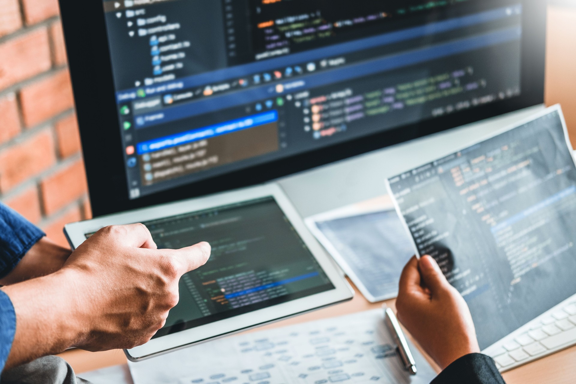 Developing programmer Team Development Website design and coding technologies working in software company office